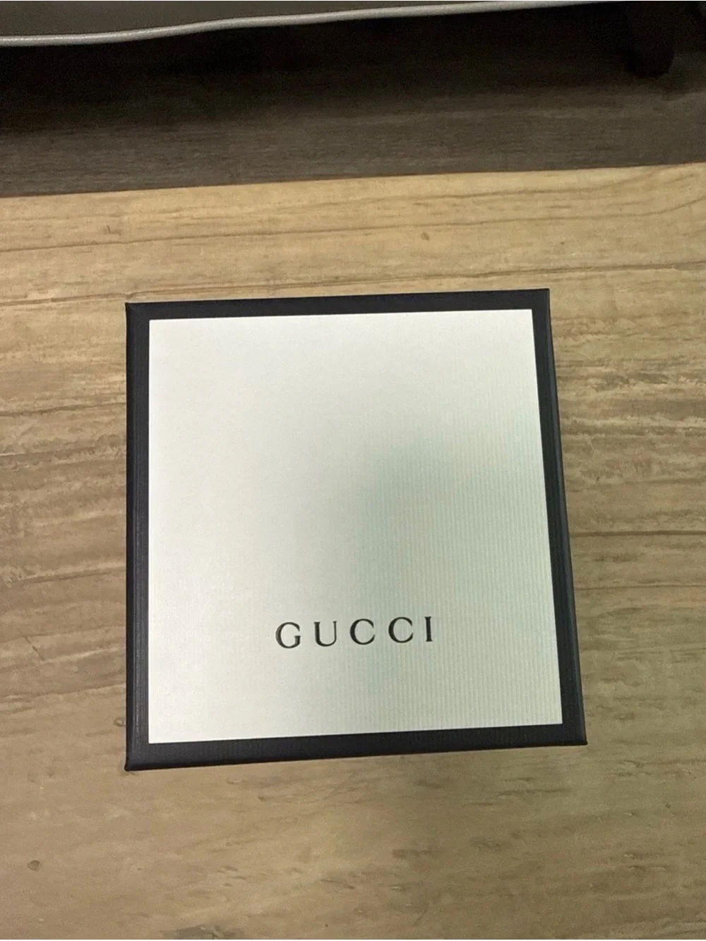 Gucci Gold-Tone Watch with Turquoise Marble Dial and Black Strap